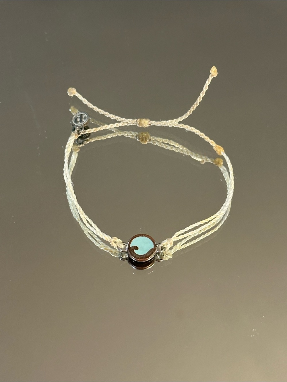 Pura Vida. Adjustable Cream Wavy Circle Cord Bracelet